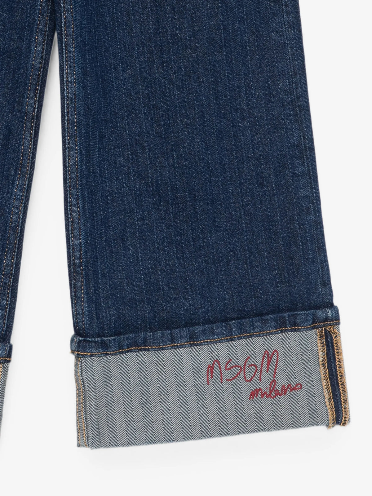 JEANS BLU CON RISVOLTO LOGO IN RICAMO ROSSO MSGM
