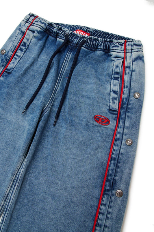 JEANS IN DENIM CON BOTTONI LATERALI CON LOGO ROSSO DIESEL - Angel Luxury