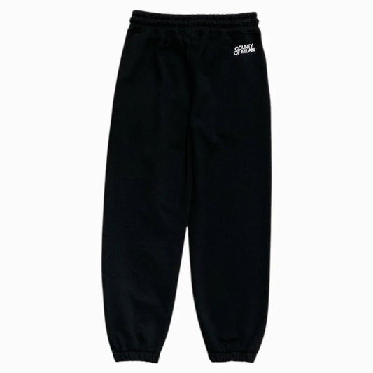 PANTALONE DI TUTA NERO CON LOGO BIANCO MARCELO BURLON - Angel Luxury