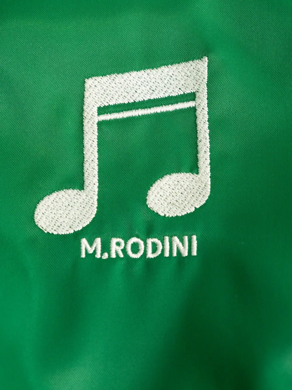 GIUBBINO VERDE CON NOTA MUSICALE MINI RODINI - Angel Luxury