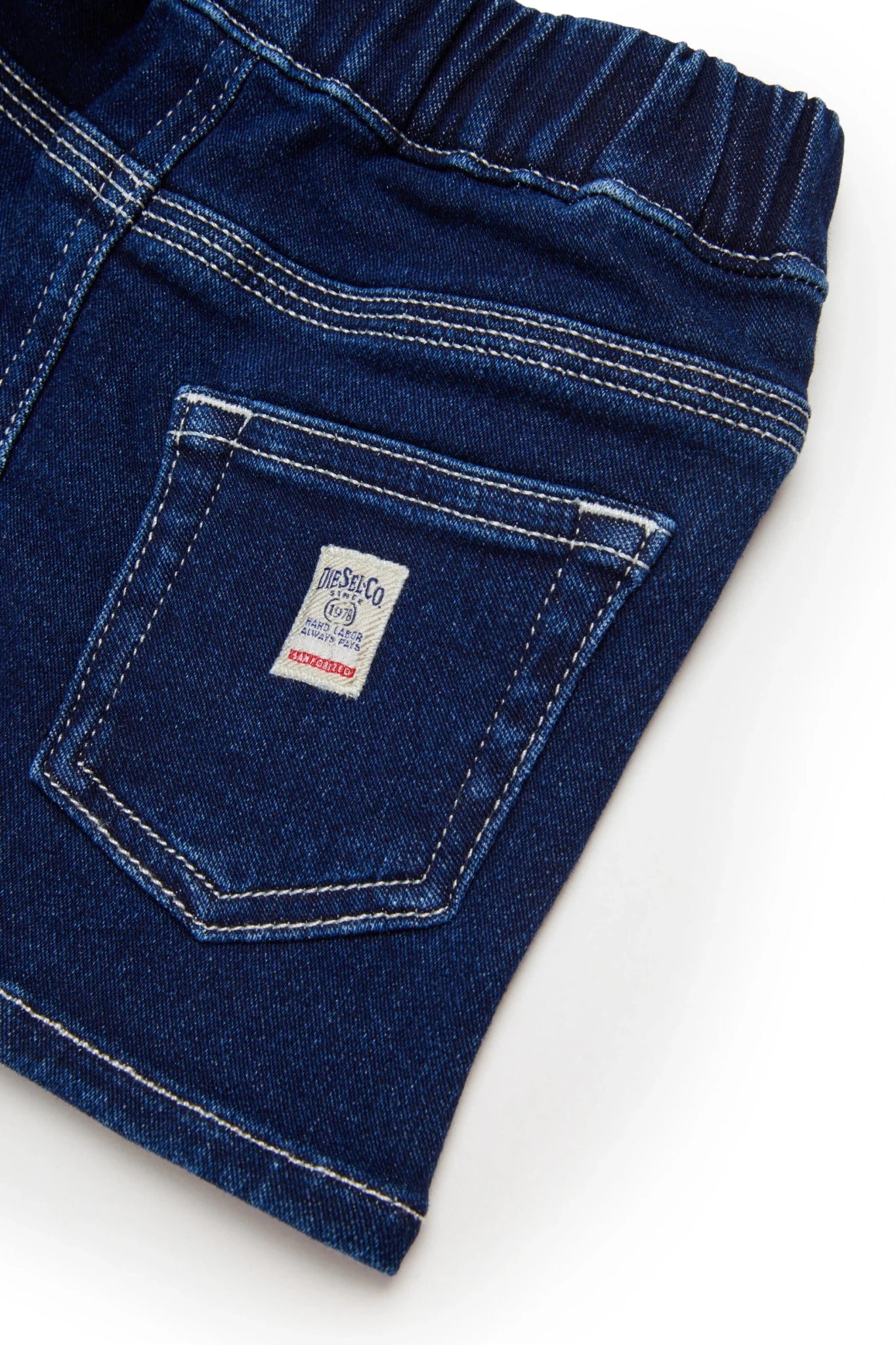 GONNA IN DENIM BLU SCURO CON LOGO SUL RETRO DIESEL - Angel Luxury