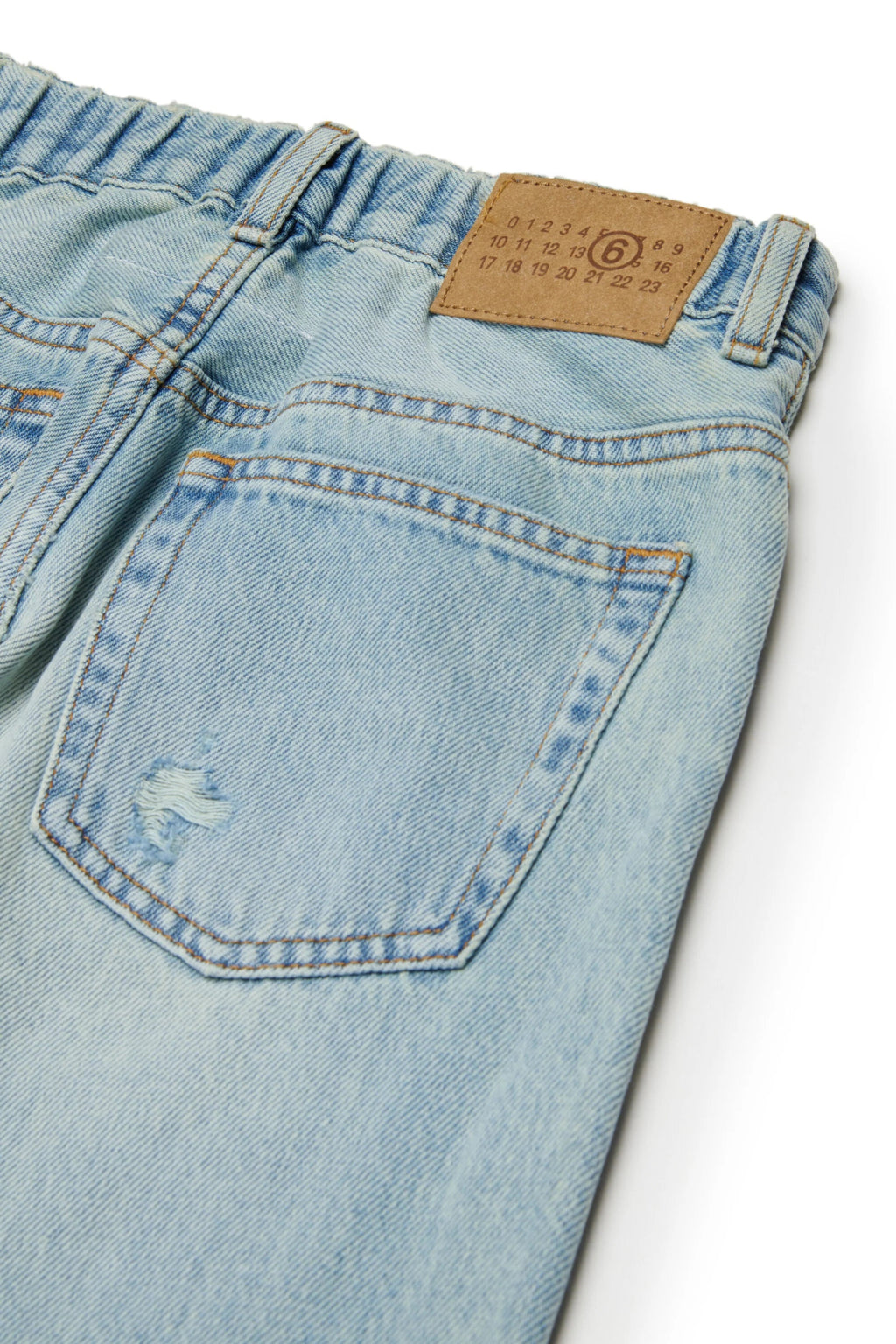 JEANS BLU CHIARO CON EFFETTO TOPPE MAISON MARGIELA - Angel Luxury