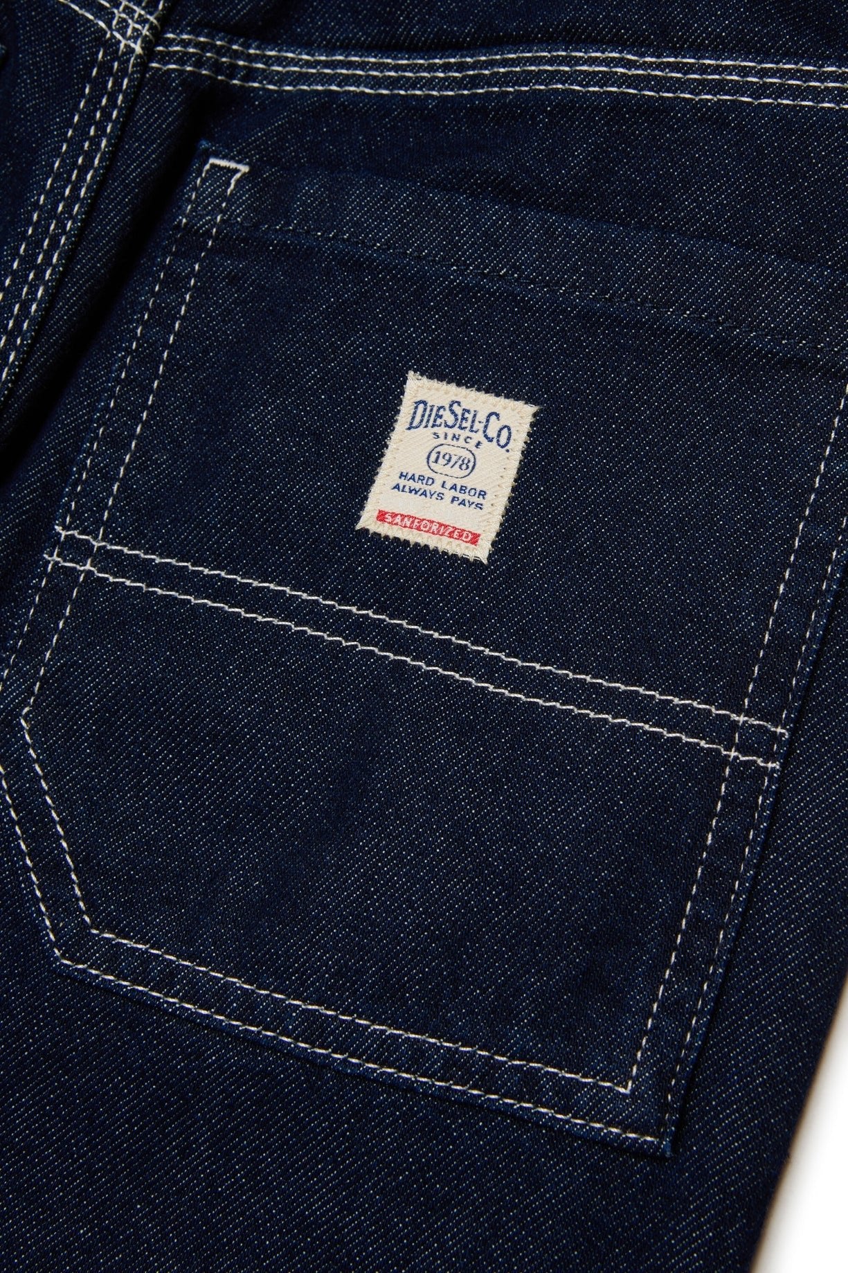 JEANS BLU SCURO CON LOGO SUL RETRO DIESEL - Angel Luxury