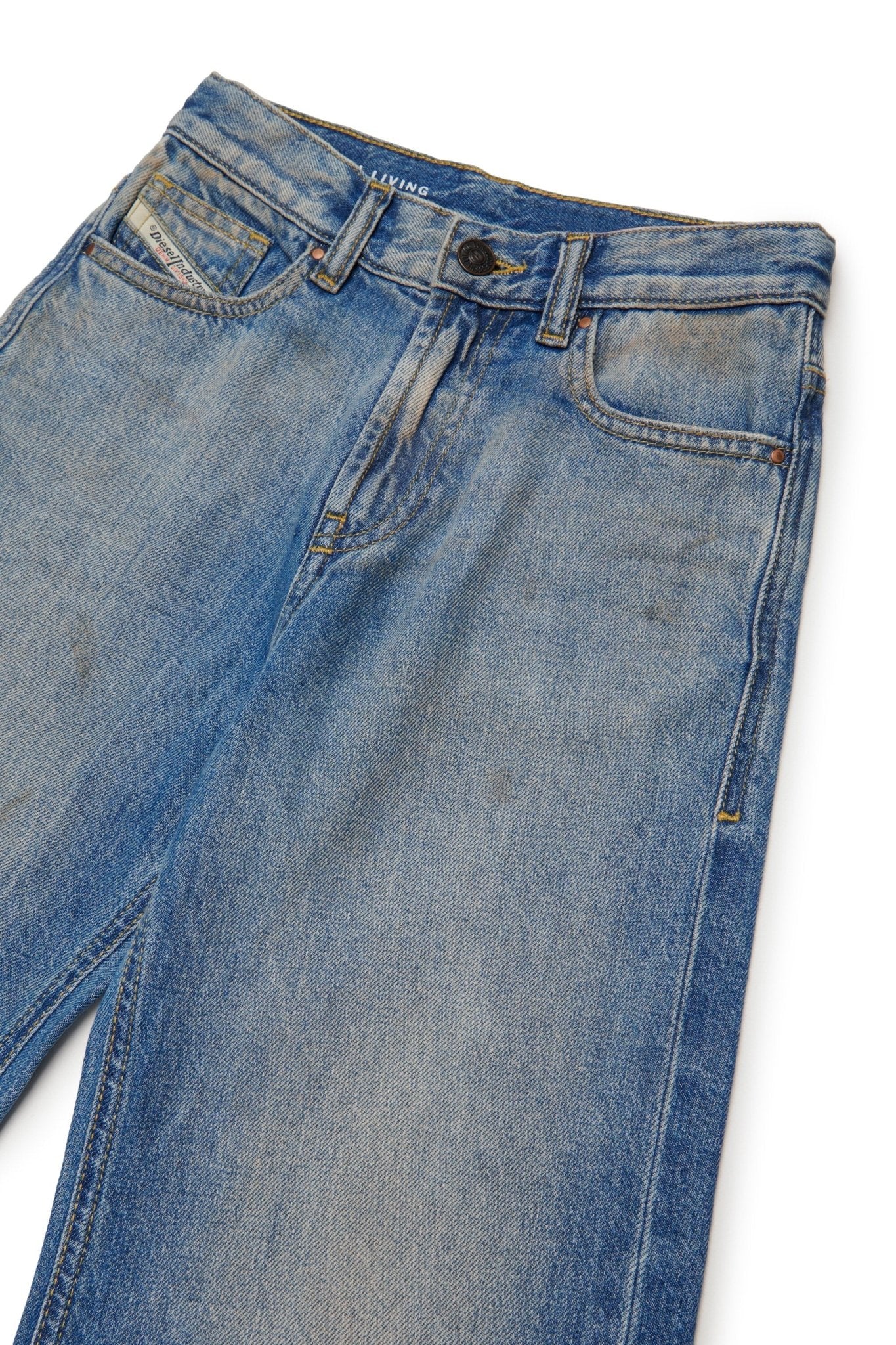JEANS IN DENIM CHIARO CON GAMBA LARGA DIESEL - Angel Luxury
