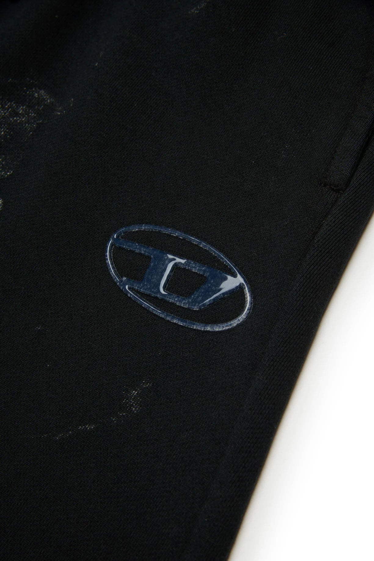 PANTALONE MARMORIZZATO CON LOGO TRASPARENTE DIESEL - Angel Luxury
