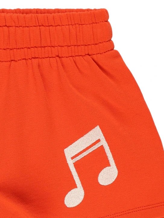 SHORTS IN FELPA ARANCIO CON NOTA MUSICALE MINI RODINI - Angel Luxury